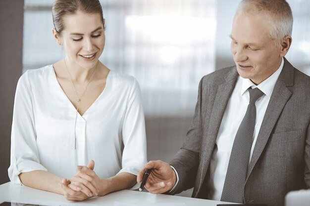elderly-businessman-woman-sitting-communicating-sunny-office-adult-business-people-lawyers-working-together-as-partners-colleagues-meeting_665183-11310